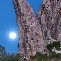 Full moon with pinnacle on the descent of Navazo Alto close to the village Benacocaz